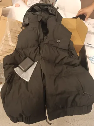 Chaleco calefactable sin usar en su caja