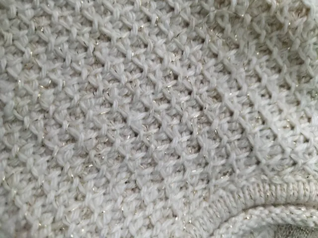 Chaqueta niña punto beige cremallera asimétrica