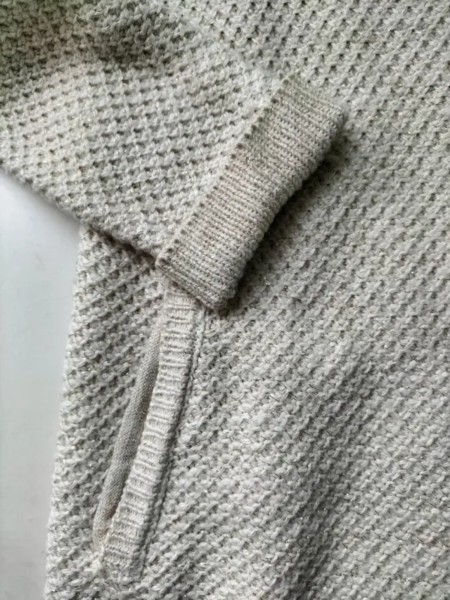 Chaqueta niña punto beige cremallera asimétrica