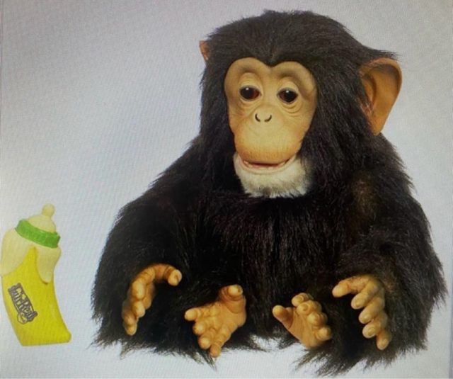 Scimmia interattiva giocattolo