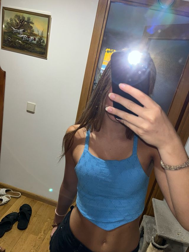 Top azul tejido