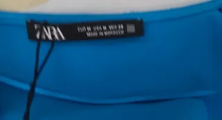 Vestido de raso con manga larga