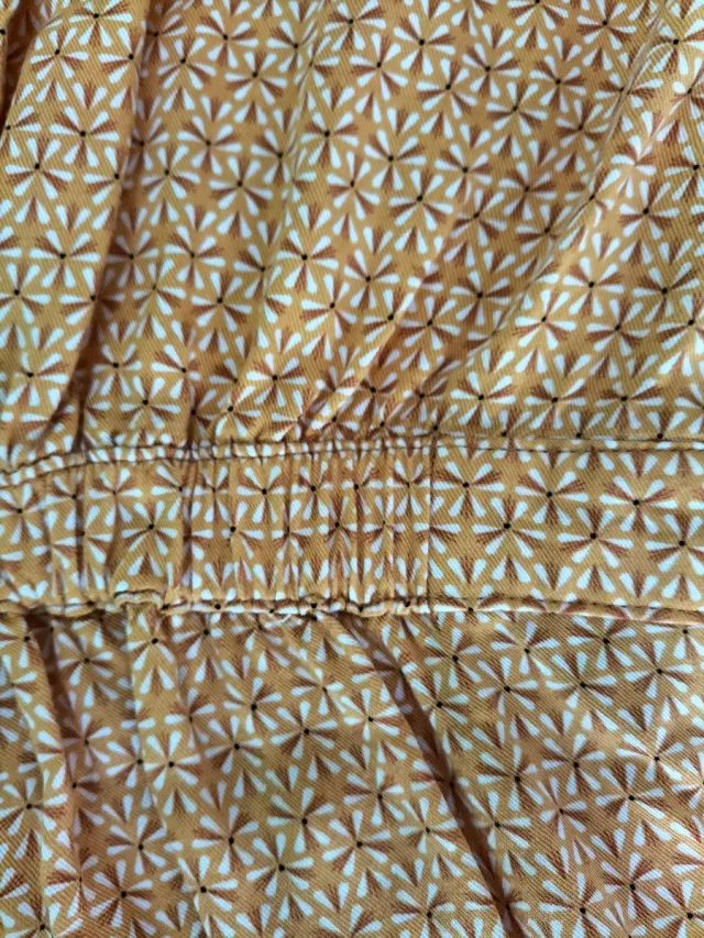 Mono corto niña Okaidi mostaza