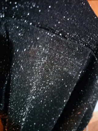 Pantalón campana brillante negro y plateado