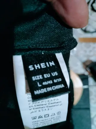 Pantalón campana brillante negro y plateado