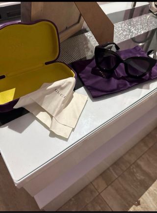 Gafas Gucci Negras y plateadas degradadas.