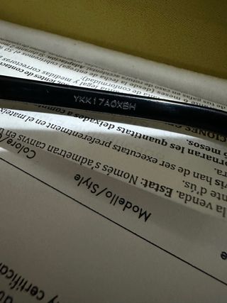 Gafas de sol Gucci negras y doradas