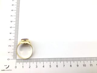 sello oro 18k con piedra con rubi