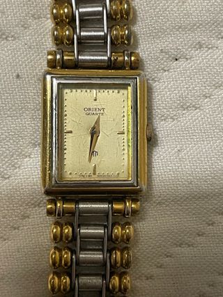 Reloj Orient Quartz Dorado y Plateado