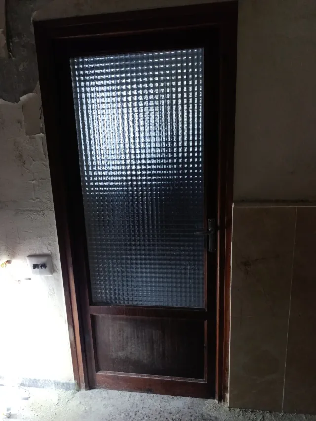 Puerta madera acristalada