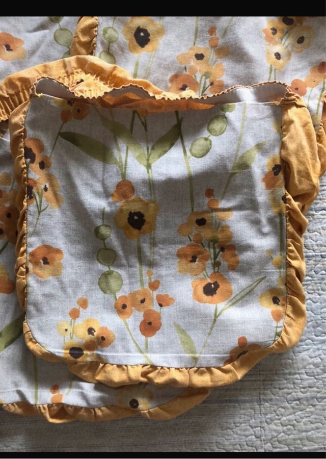 Coprisedie floreali gialli e verdi