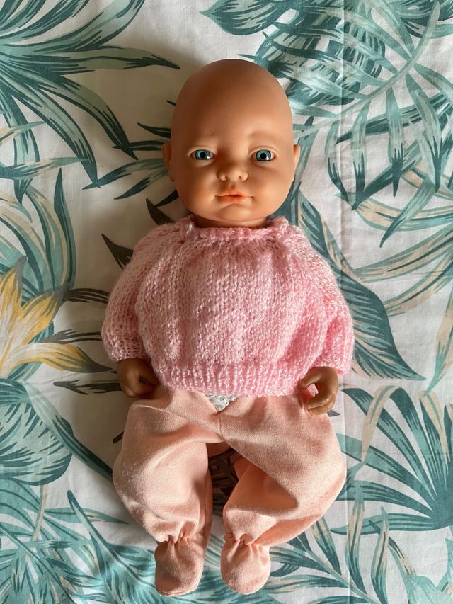 Bambola neonata con completo rosa
