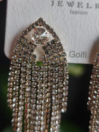 Pendientes largos con piedras dorados