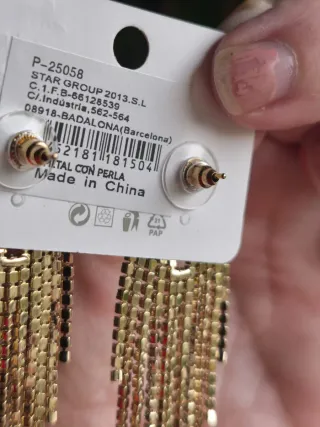 Pendientes largos con piedras dorados