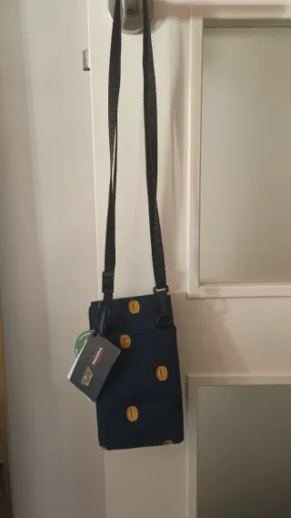 Bolsito Eastpak Super Mario Monedas