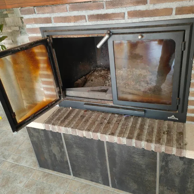 Insertable de leña con puerta de cristal