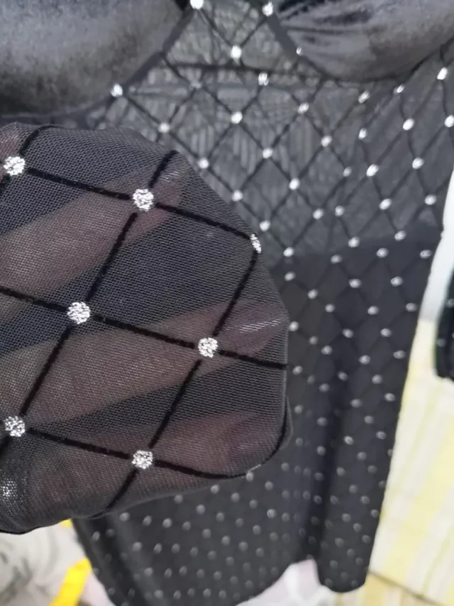 Vestito nero con brillantini