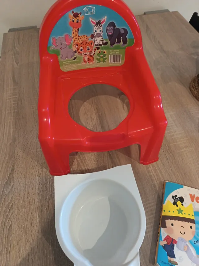 Orinal infantil con libro musical