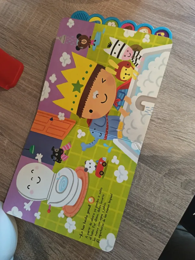 Orinal infantil con libro musical