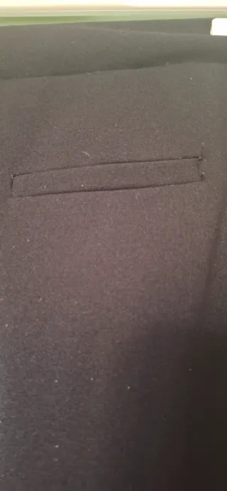 Pantaloni sportivi neri con banda gialla