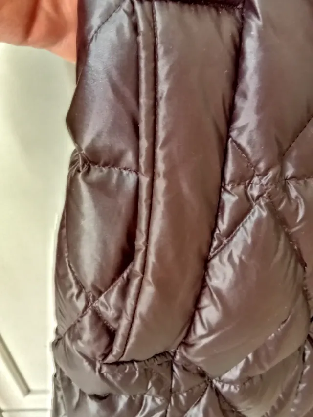 Piumino lungo con pelliccia sintetica