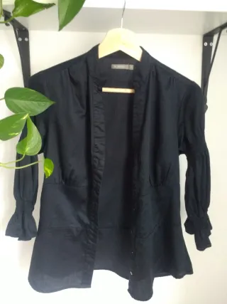 Blusa negra In Extenso