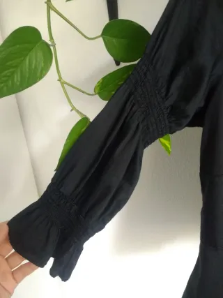 Blusa negra In Extenso