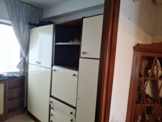 Mueble de salón modular beige y marrón