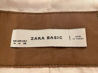 Cazadora de cuero 100% Zara, color marrón.