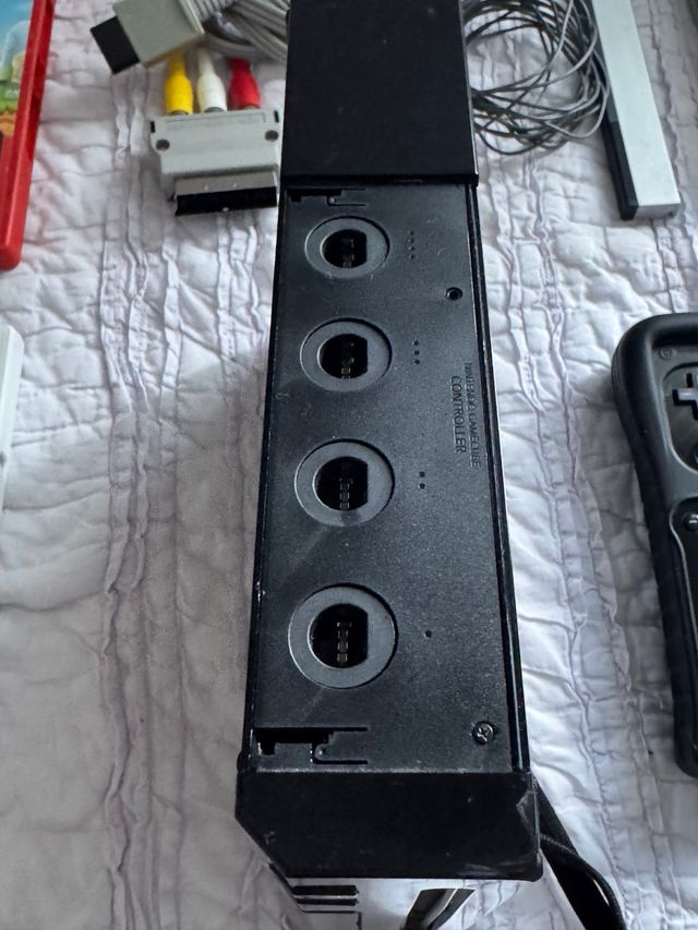 Consola Wii nera + 2 comandi + 6 giochi