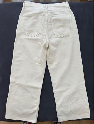 Pantalón ancho Mango beige, talla 34 EUR.