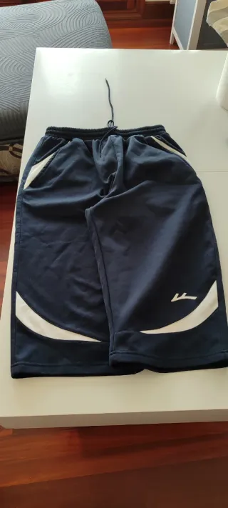 Pantalón corto marca Futsal azul y blanco