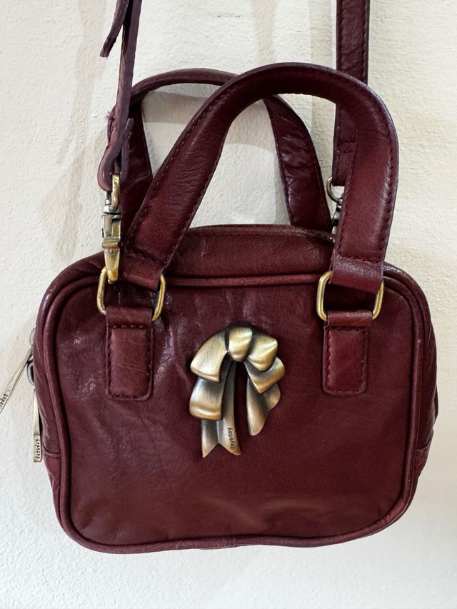 Bolso piel burdeos Dayaday con detalle lazo