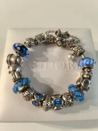 Pulsera Pandora Disney 18 charms IMPECABLE