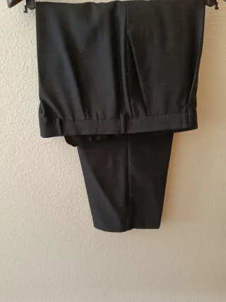 Traje negro con chaleco