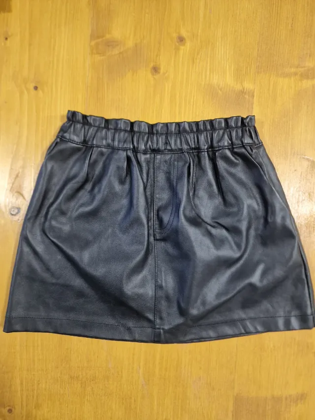 Falda simil piel niña T.8