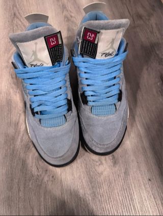 Jordan 4 University Blue Trattabile
