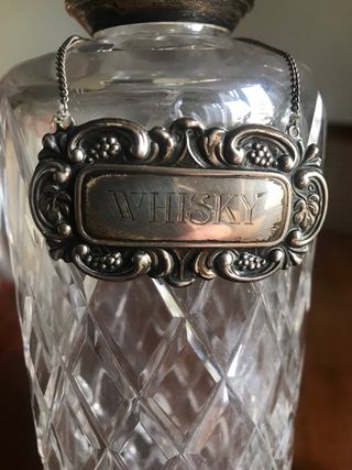 Set di 2 bottiglie in cristallo intagliato e argento