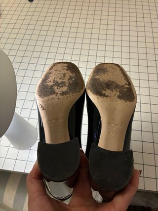 Tronchetti Miu Miu neri vernice tacco