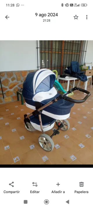 Carrito de bebé azul y blanco NEGOCIABLE