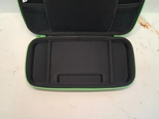 Funda rígida Nintendo Switch verde