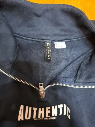 Sudadera corta con cremallera y bloques de color