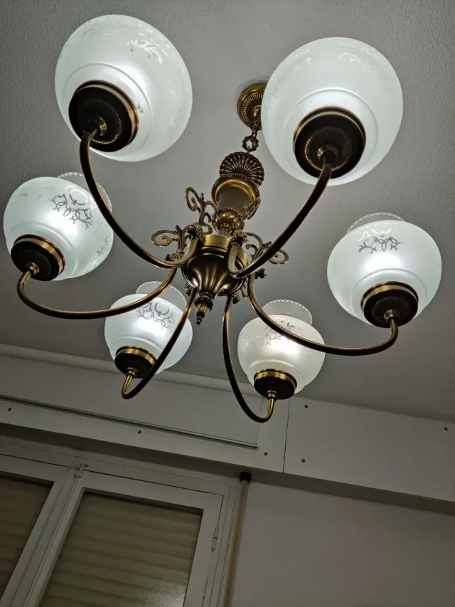 Apliques de pared dorados y transparentes