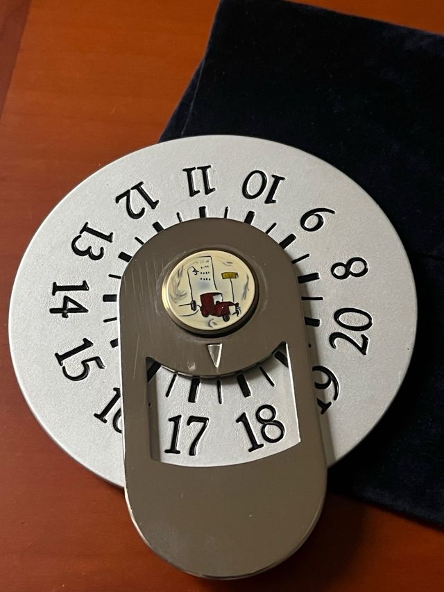 Disco orario vintage in metallo