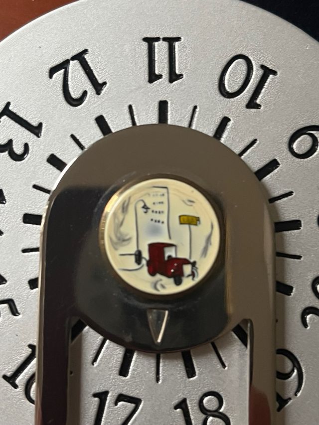 Disco orario vintage in metallo