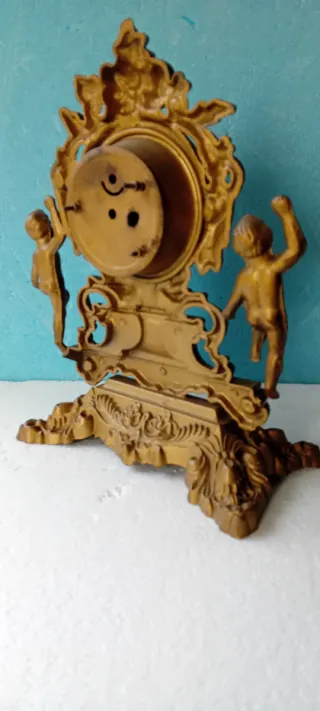 Orologio da tavolo con putti dorati