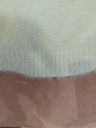 Jersey blanco con estrella de lentejuelas