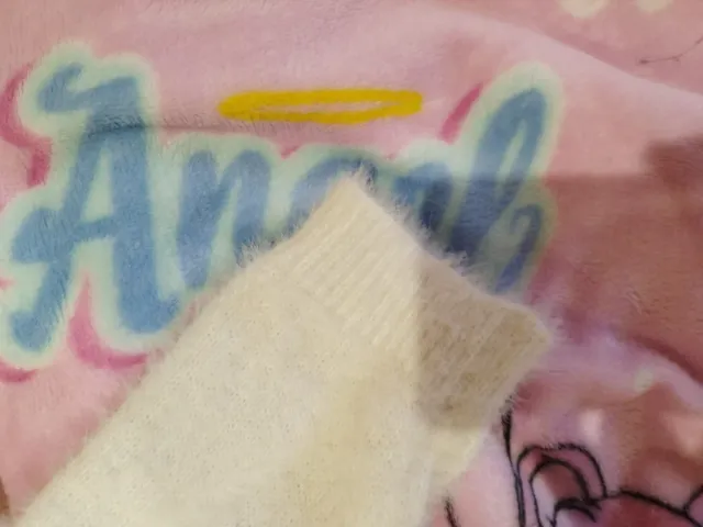 Jersey blanco con estrella de lentejuelas