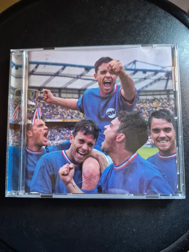 Robbie Williams - Sing When You're Winning.