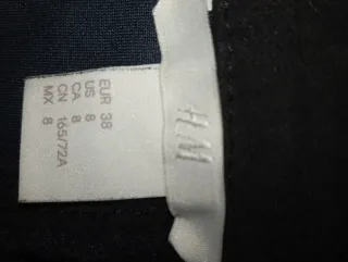 Falda ante negra botones